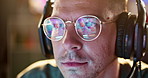 Man, glasses and work with reflection of computer, art and online project with creative for design. Gaming, programmer or technology on video game with headphones or zoom of web app for innovation