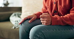 Hands, stress and anxiety worry on sofa with mental health depression or nervous, distress or fear. Person, fingers and adhd stimming in living room with touch for psychology, distracted or upset