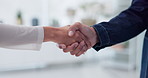 Business people, handshake and deal for partnership closeup, collaboration or support of designers. Shaking hands, agreement and teamwork of employees greeting, meeting or welcome to startup office