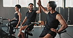 Friends, workout and gym together with high five for fitness, training and exercise to build muscle on arms or legs. People, crosstrainer or cycling bike for cardiovascular strength and determination