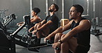 Rower, gym and people with fitness, training and intense workout with wellness and endurance progress. Group, health center and men with woman and support with exercise, power or cardio with rowing
