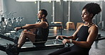 Exercise, rowing machine and woman with group in gym for wellness or tired of sports for body health. Friends, club and workout on ergometer for fitness, muscle and cross training for cardio together