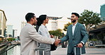 Business, travel and welcome handshake with people meeting for partnership and deal agreement in the city. Greeting, outdoor and introduction of consulting team with hello to corporate client
