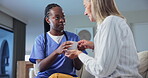 Senior woman, coffee and doctor with support in hospital, clinic and nursing home for health, wellness and care. Patient, nurse and healthcare worker with people for medical exam, help and consulting