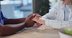 Caregiver, holding hands and senior person with nurse, support and trust together at retirement home. Elderly care, medical help and healthcare with empathy, solidarity and gratitude in a house