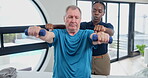 Dumbbells, training and man with physiotherapy for fitness, exercise and workout for health. Physiotherapist, medical worker and senior patient for healthcare at hospital, clinic and wellness center