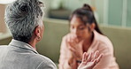Woman, conversation and client at counseling session for psychotherapy or develop coping skills for emotions. Mature female therapist, communication and empathy for healing, mental health and advice.