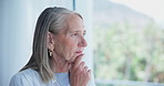 Senior woman, thinking and memory by window with ideas, decision or choice in home for retirement. Elderly person, remember and perspective with insight, worry or mental health with anxiety in house