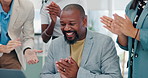 Applause, celebration and business people in office with achievement, good news or promotion. Happy, fist bump and professional black man winner with team for clapping hands and cheering in workplace