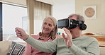 Senior couple, virtual reality and smile in home for pointing, click or play 3d metaverse game on internet in living room. Vr, man and woman on sofa with future technology, cyber and entertainment