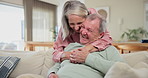 Home, hug and funny with old couple, love and bonding together with marriage and romance. Apartment, embrace and senior man with elderly woman and smile with support and trust with anniversary or joy