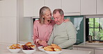 Food, eat and senior couple in kitchen, laugh and breakfast in retirement home together. Bonding, love and enjoyment for elderly married people, romance and feeding with snack for nutrition or health
