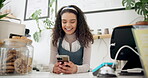 Woman, coffee shop and barista with smartphone for ecommerce, networking or funny conversation. Female person, waitress and technology in small business for media update, cafe blog and online service