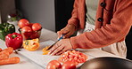 Hands, woman and cut vegetables to cook for dinner with  diet, nutrition and health living at home. Female person, closeup and vegetarian food for healthy meal with ingredients or recipes for soup.

