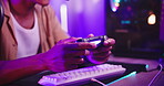 Hands, controller and gamer streaming online, esports competition or tournament with computer keyboard at home. Neon light, content creation and person with pro gaming for social media with internet
