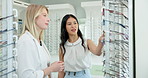 Glasses, store and customer in consultation with optometrist and helping woman with advice or choice. Prescription, spectacles and person shop with decision for eyewear and lens with frame in retail