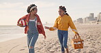 Women, beach and basket with picnic, date and joy for happiness and love with fun. LGBT couple, nature and los angeles ocean with summer journey and freedom or adventure for lesbian relationship