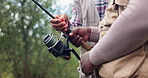 Hands, people and fishing rod in nature for adventure with teaching, excited or help for catch. Friends, fisherman and together for game, sport or angling for support in countryside, bush or vacation