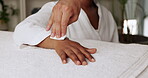Hand, spa and acupuncture or massage with oil for skincare treatment with self care, relaxation and refresh. Closeup, luxury and cosmetics for health benefit or fresh skin on break or holiday.