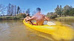 Boat, canoe and couple on river in nature for holiday, summer vacation and weekend outdoors. Water sports, kayaking and man and woman on fun adventure for content creation, vlog and travel influencer