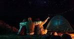 Friends, hug and camping with stars at night for adventure, holiday fun and outdoor activity. Campsite, people and pointing to sky with embrace, tent in nature and travel with hand gesture in woods 