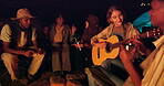 Camping, guitar and friends singing at night together for adventure, bonding or weekend getaway. Nature, relax and group of young people playing instrument for music on campsite for vacation