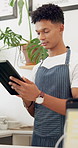 Restaurant, tablet and man waiter with app for ecommerce, orders or fast food delivery service. Coffee shop, inventory and male server with digital checklist for cafeteria stock, sales or review
