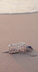 Plastic bottle, beach and nature pollution or earth waste management in environment, recycling or eco friendly. Garbage, ocean and litter outdoor or cleaning activism or volunteering, sea or global