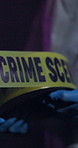 Person, hands and tape with crime scene for no entry, sign or investigation in progress for evidence or murder at night. Closeup of forensic investigator with emergency, warning barricade or closure