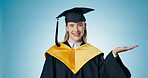 Studio, graduation and girl with hand, goals and event in university for degree, celebrate and future. Pride, student and pointing for achievement, college and diploma with education with scholarship