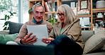 Paperwork, bills and senior couple on sofa with home budget, pension plan or insurance application. Laptop, man and woman on couch with retirement documents, contract or discussion in living room