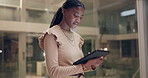 Office, night and business black woman on tablet for online project, website review and internet report. Professional, creative agency and worker on digital tech for networking, research and news