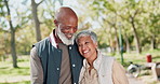 Love, happy and senior couple hug while walking in a park with conversation, trust and bonding in nature. Interracial marriage, care and elderly people in a forest with retirement, fun or travel