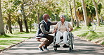 Love, old man and senior woman in wheelchair, nature and conversation with support, care and marriage. Outdoor, couple and person with disability, sunshine and relationship with trees, joy or romance