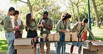 Volunteer, people and food donation box in park for lunch, bags and community service with non profit. Teamwork, happy and project at NGO and social responsibility charity with groceries outdoor