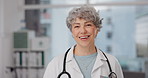 Medical, doctor and smile with face of old woman in office for consulting, wellness and medicine. Healthcare, happy and expert with portrait of senior person in hospital for surgery and professional