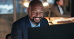 Reading online, thinking and happy black man at computer in office with email, report or review at night. Market research, smile and business insight at overtime and businessman checking web article.