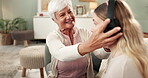 Headphones, grandmother and daughter with music, listen and online in home. Technology, podcast and radio for streaming song on internet, digital and family for retired female person in living room