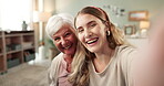 Selfie, grandmother and daughter in home, living room and family for digital memory. Social media, profile picture with portrait and smile with elderly woman, retired and lounge for photo on sofa