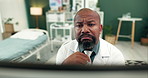 Healthcare, doctor and confused black man on computer for medical service, telehealth and diagnosis. Hospital, consulting room and person thinking for online research, website and insurance in clinic