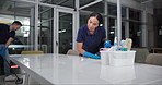 Professional, cleaning service or team in office space with maintenance process, protection or disinfection. Workspace, hygiene or cleaner people with product for safety, dust or bacteria prevention