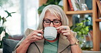Home, relax and senior woman with coffee, retirement and happiness with latte in living room. Mature lady, apartment and pensioner with cup, cappuccino and espresso with morning tea, calm and peace