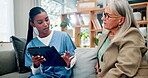 Senior woman, nurse and tablet for healthcare in home, consulting and advice for diagnosis on couch. Female person, caregiver and support in retirement for health, patient and planning for medicare