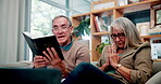 Senior couple, home and reading bible in sofa with praying for faith, worship and healing. People, relationship and Christian with spiritual practice or study verse for hope, trust and religion