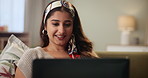Sofa, watch and Indian woman on laptop for movie streaming service, film or drama with interesting story. Person in surprise, shock and relax at home on computer for online TV show, series and video