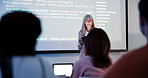 Female teacher, coding and screen in class for education with html, teaching with technology for web development. Woman, lecture and tablet for projection to class, introduction to programming