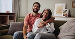 Happy, hug or love and couple on sofa in living room of home with smile for support or trust. Peace, portrait or relax with man and woman in apartment together for affection, bonding or romance