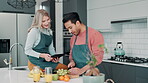 Cooking, video and couple in kitchen with tablet for streaming healthy recipe, ideas and online learning. Happy, man and woman relax with tech in home and help with fruit, vegetables and watch chef