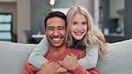Couple, home and happy with hug in sofa for love, care and support with bonding and fun. Relationship, people and smile in living room on couch with joy, fun and laugh as soulmate on day off