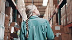 Back, woman and logistics in distribution warehouse, for inspection, check inventory or quality control. Business, cardboard box and female person for stock, supply chain or shipping in factory